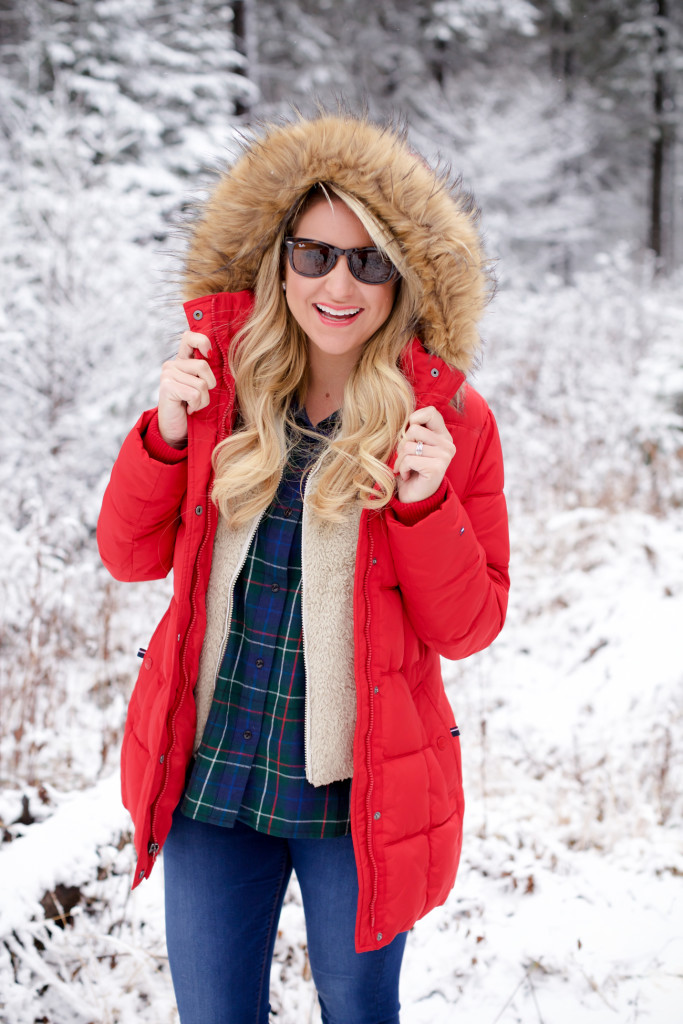 Red puffer snow coat with plaid shirt patagonia soft vest and ugg boots-5