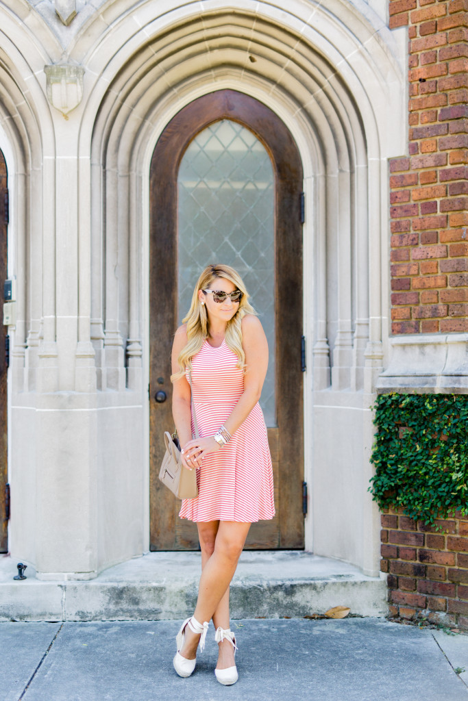 stripe fit and flare dress with celine hand bag and prada sunglasses with lace up wedges